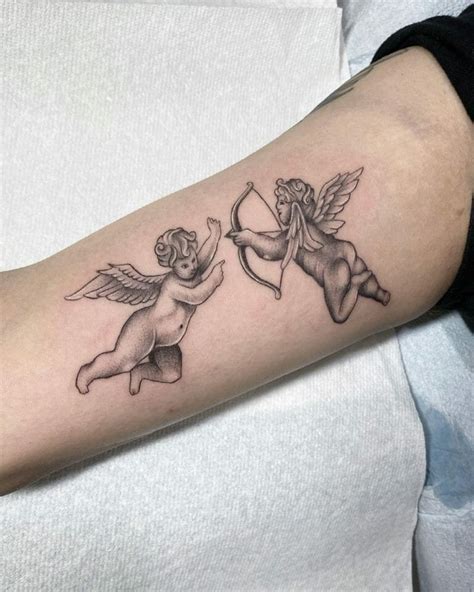 On the other hand, an arrow resting on a bow may instead represent the achievement of peace and calm. . Small cupid tattoo